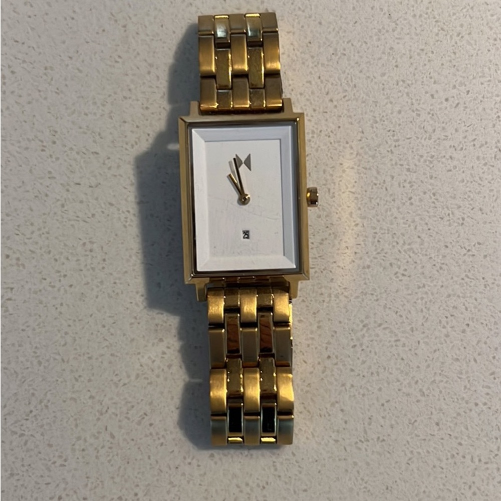 Women’s gold MVMT watch